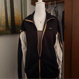 Nike Women’s Black and Gold Jacket